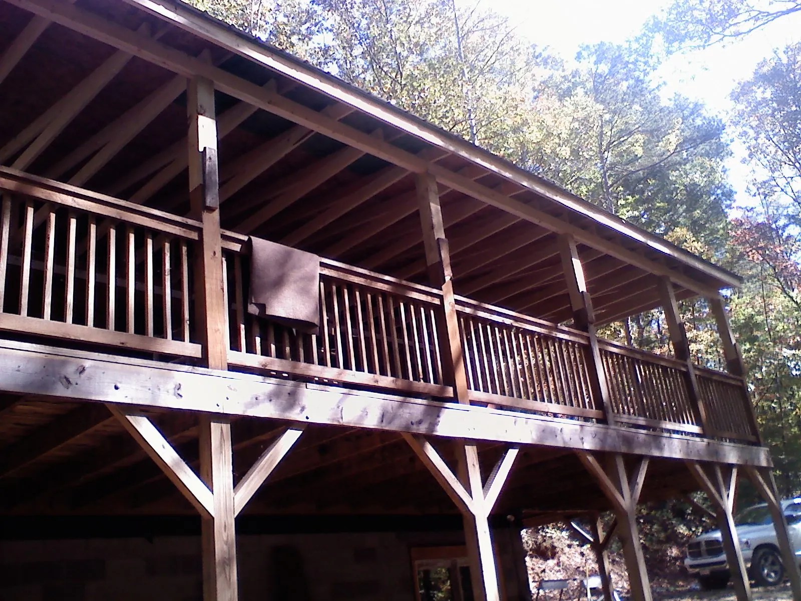 Timber framing under a new elevated porch and deck — Roof Leak Repair in Grosse Pointe by Roofing Brothers